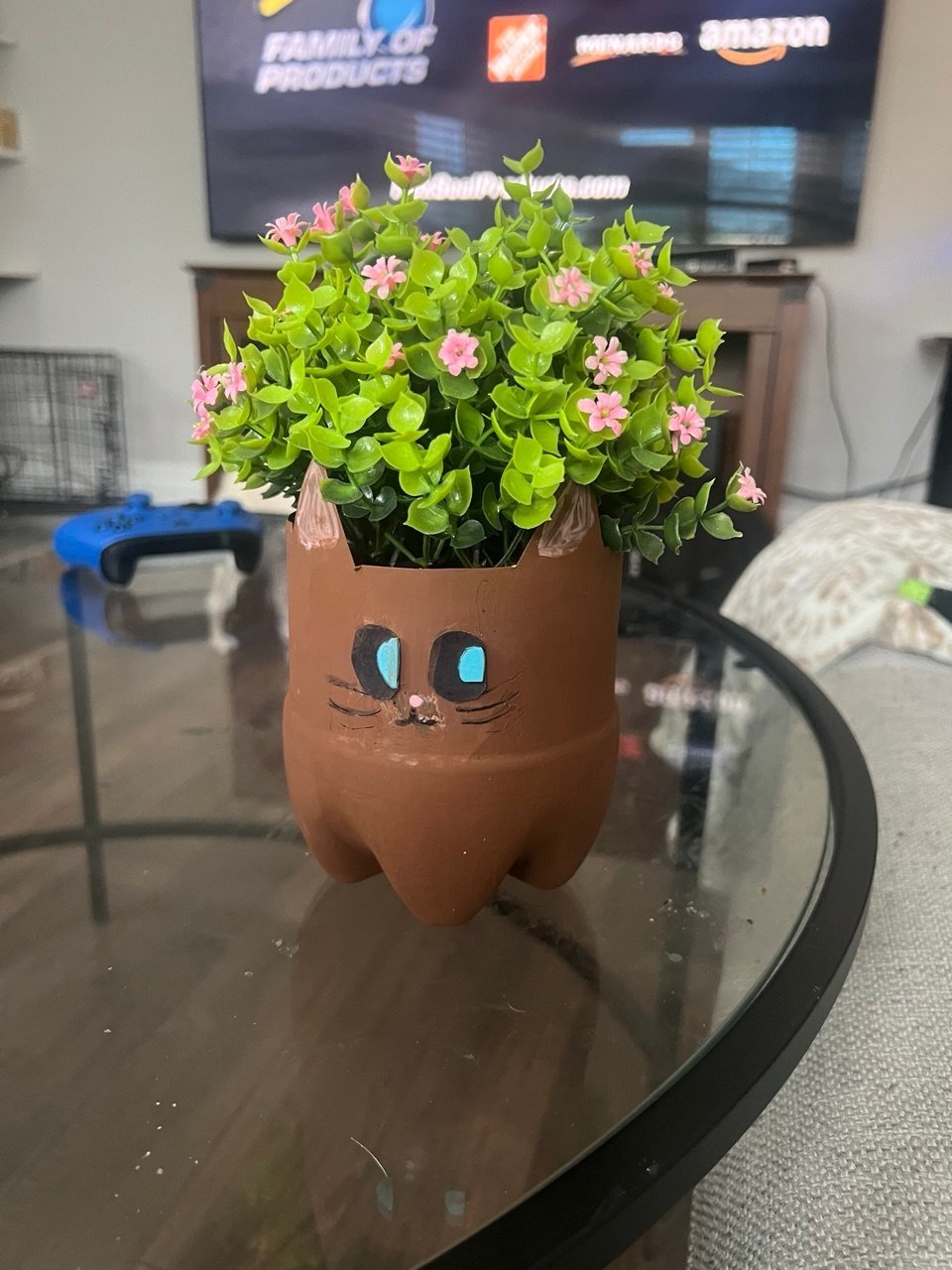 Whiskers the kitty PetPot with pink flowers